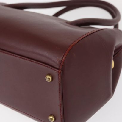 CARTIER Sac « Must Line » en cuir bordeaux,...