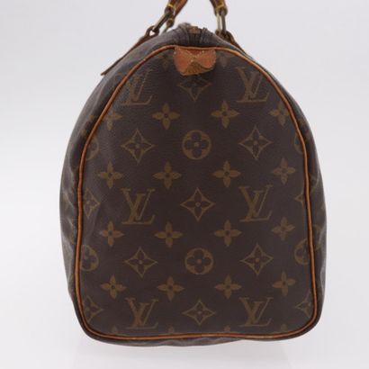 LOUIS VUITTON “Speedy” bag in brown Monogram...