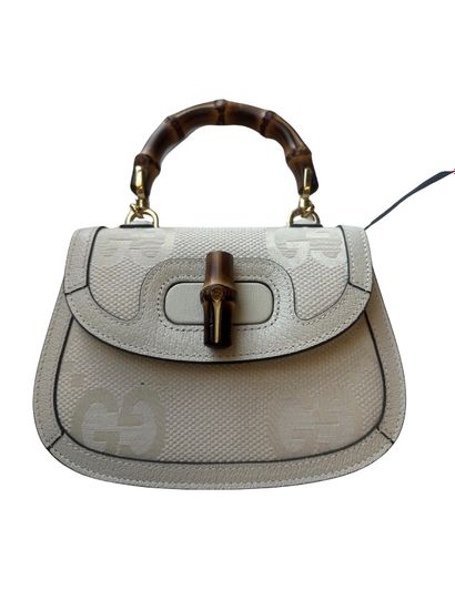 GUCCI “Vintage Convertible Bamboo Top Handle”...