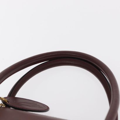 CARTIER Sac « Must Line » en cuir bordeaux,...