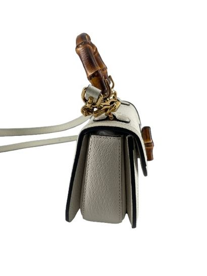 GUCCI “Vintage Convertible Bamboo Top Handle”...