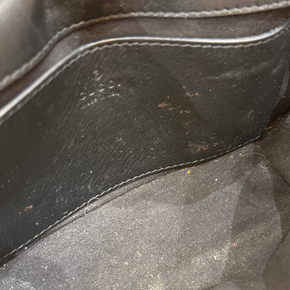GUCCI “GG Marmont Flap” Bag in black leather,...