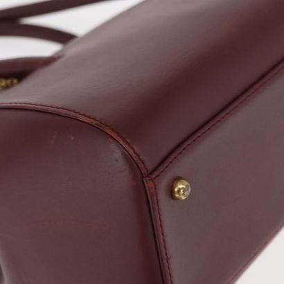 CARTIER Sac « Must Line » en cuir bordeaux,...