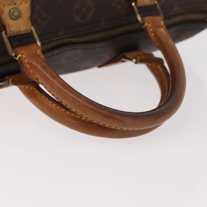 LOUIS VUITTON “Speedy” bag in brown Monogram...
