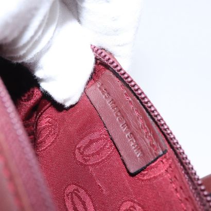 CARTIER Sac « Must Line » en cuir bordeaux,...