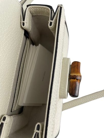 GUCCI “Vintage Convertible Bamboo Top Handle”...