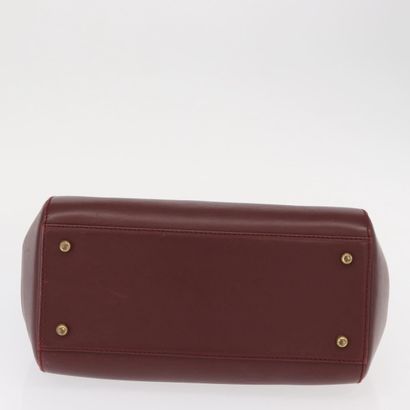 CARTIER Sac « Must Line » en cuir bordeaux,...