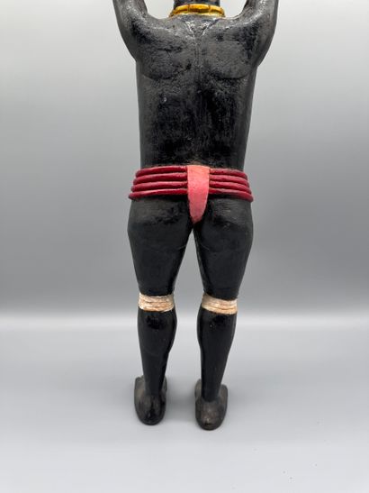 ANTHROPOMORPHIC STATUETTE DEPICTING A WOMAN...