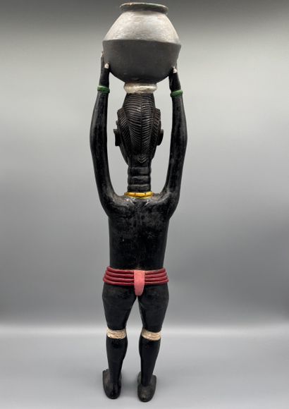 ANTHROPOMORPHIC STATUETTE DEPICTING A WOMAN...