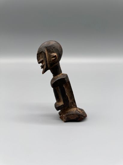 DOGON STATUETTE, MALI Wood with a dark patina....