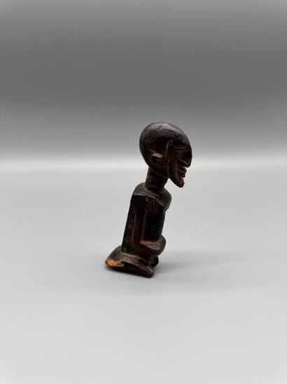 DOGON STATUETTE, MALI Wood with a dark patina....