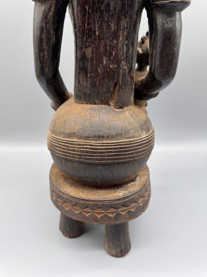 MOTHER WITH CHILD SEATED ON A STOOL, SENOUFO,...