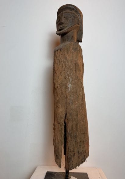 ANTHROPOMORPHIC PILLAR STATUE
Mid-20th century....