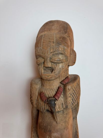 ANTHROPOMORPHIC STATUE WITH A PEARL NECKLACE...
