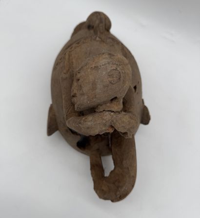 MASK WITH A FIGURE ON TOP
Mid-20th century....