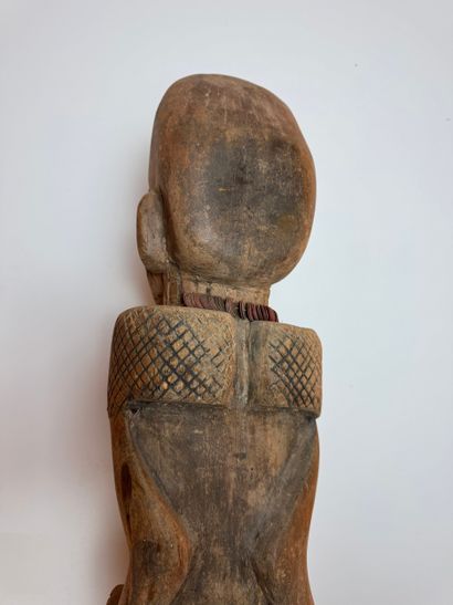 ANTHROPOMORPHIC STATUE WITH A PEARL NECKLACE...