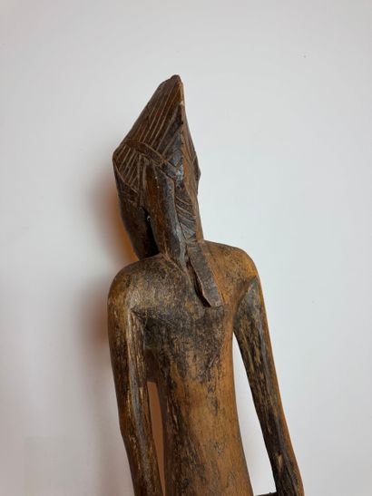 STATUE OF A SEATED WOMAN, SENOUFO, IVORY...