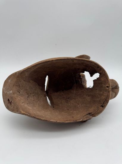 MASK WITH A FIGURE ON TOP
Mid-20th century....