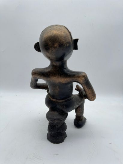 SEATED MALE STATUE WITH HANDS ON THIGHS
Mid-20th...