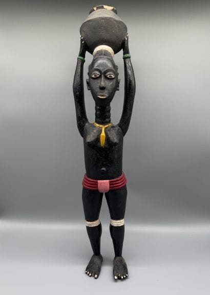 ANTHROPOMORPHIC STATUETTE DEPICTING A WOMAN...