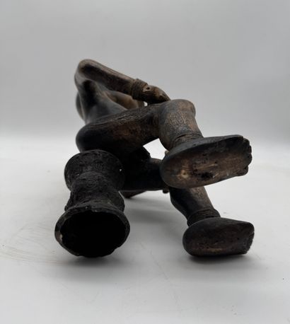 SEATED MALE STATUE WITH HANDS ON THIGHS
Mid-20th...