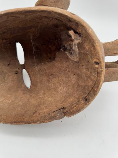 MASK WITH A FIGURE ON TOP
Mid-20th century....