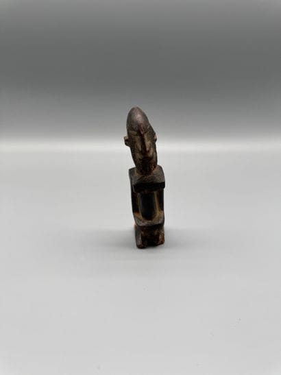DOGON STATUETTE, MALI Wood with a dark patina....