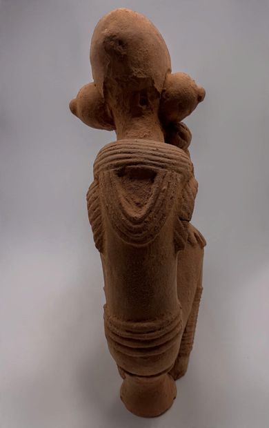 KNELT FIGURE, IN THE STYLE OF THE NOK CULTURE...