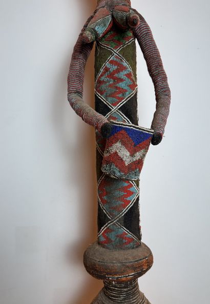 PRESTIGIOUS FEMALE FIGURE HOLDING A CUP,...
