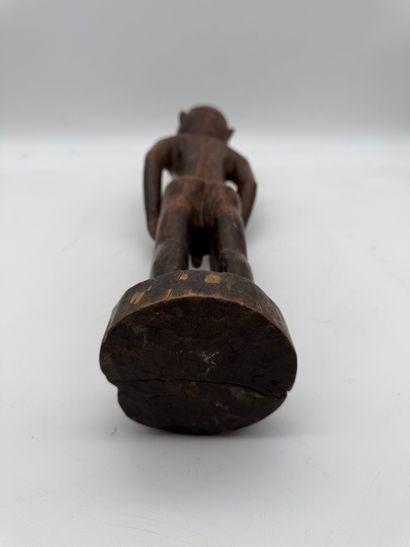 MALE STATUETTE
Mid-20th century. Wood with...