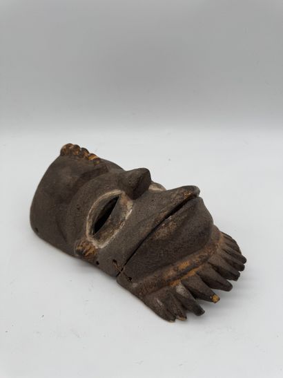 MASK WITH MOVABLE JAW
Mid-20th century. Wood,...