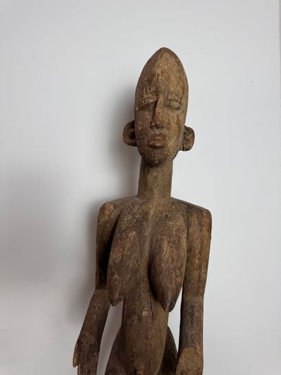 FEMALE STATUE, LOBI, BURKINA FASO Wood with...