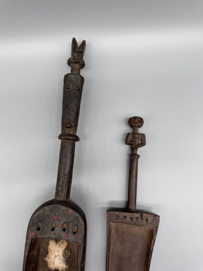 PAIR OF MUSICAL INSTRUMENTS, TANZANIA 
Wood...