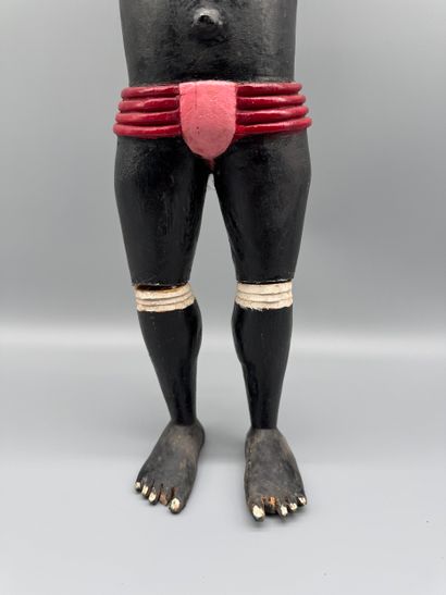 ANTHROPOMORPHIC STATUETTE DEPICTING A WOMAN...