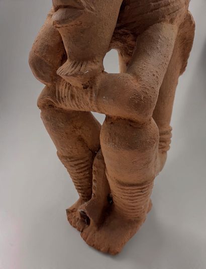 KNELT FIGURE, IN THE STYLE OF THE NOK CULTURE...