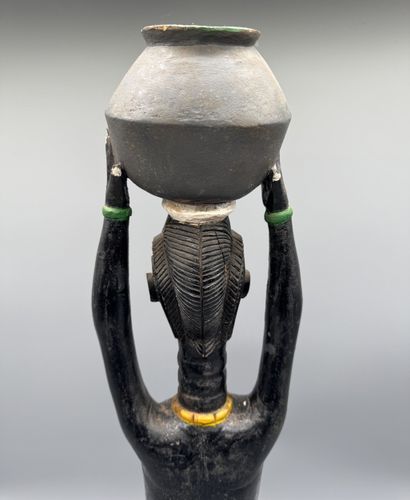 ANTHROPOMORPHIC STATUETTE DEPICTING A WOMAN...