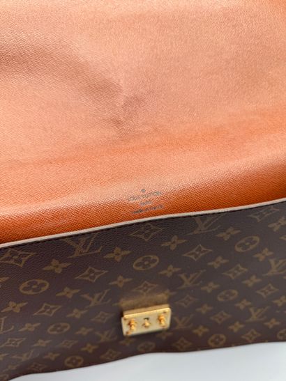 LOUIS VUITTON “SENATEUR” BRIEFCASE 
Monogram-coated...