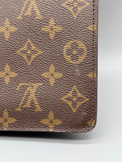 LOUIS VUITTON “SENATEUR” BRIEFCASE 
Monogram-coated...