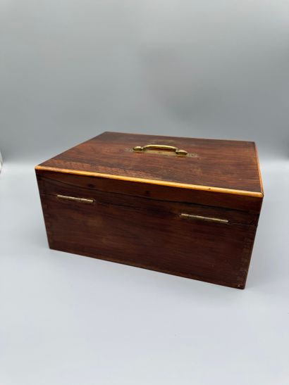 Wooden travel case with a hinged lid, featuring...