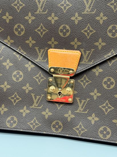 LOUIS VUITTON “SENATEUR” BRIEFCASE 
Monogram-coated...