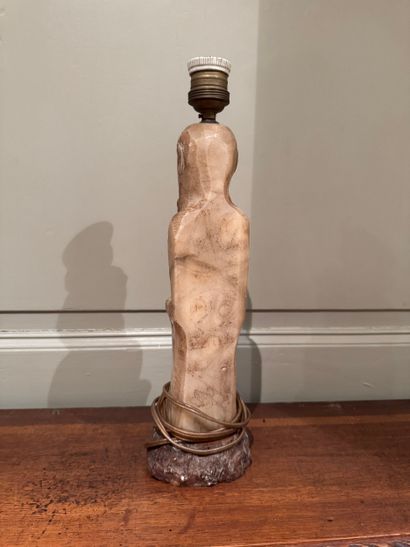 Carved stone lamp depicting a Chinese sage
Monolithic...