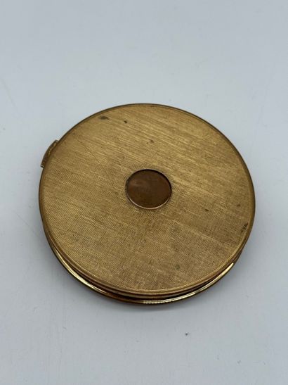 Small powder compact with a mirror, made...
