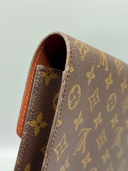 LOUIS VUITTON “SENATEUR” BRIEFCASE 
Monogram-coated...