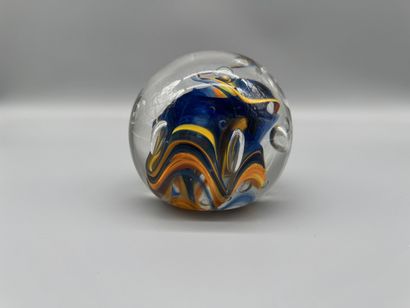 Glass paperweight with an interior design...