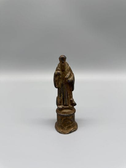 Religious statuette made of regul or a lead-based...