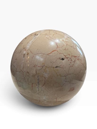 Decorative ball made of veined beige marble,...