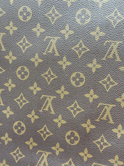 LOUIS VUITTON “SENATEUR” BRIEFCASE 
Monogram-coated...