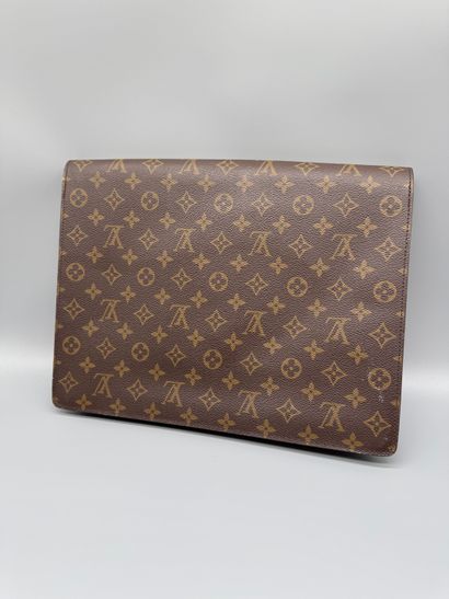 LOUIS VUITTON “SENATEUR” BRIEFCASE 
Monogram-coated...