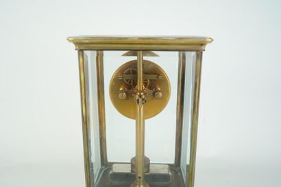 Pendule cage en laiton doré de marque Regina
XXe...
