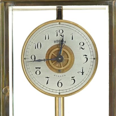 Pendule cage en laiton doré de marque Regina
XXe...